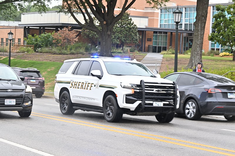 Police resond to a report of an active shooter Monday, Aug. 25, 2025 at the University of Arkansas campus. (NWA Democrat-Gazette/CALEB GRIEGER)