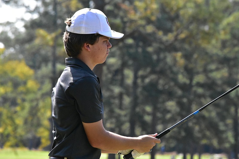 Logan Roach of White Hall lines up his shot at the No. 14 tee during the 5A state boys golf tournament at the Pine Bluff Country Club on Wednesday, Oct. 8, 2025. (Pine Bluff Commercial/I.C. Murrell)