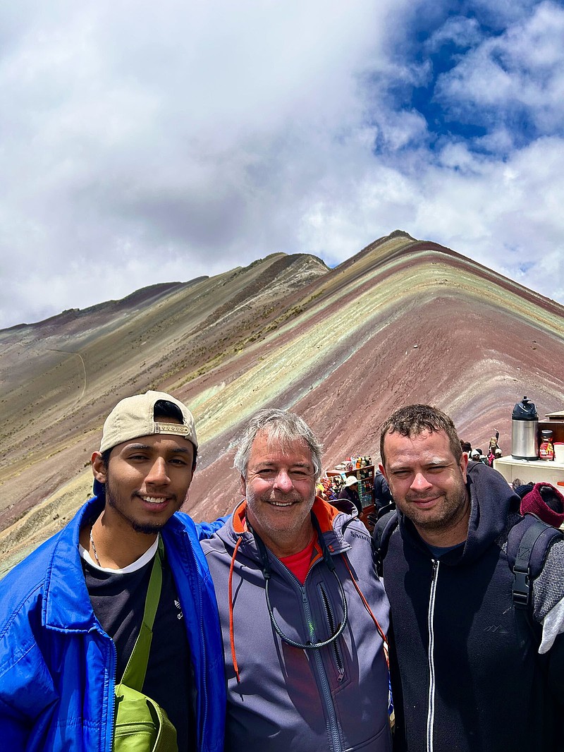 Julian Munoz (left) of Medellin, Colombia, the author (middle), and Ethan Hendricks of Glen Rose hiked 2,600 feet in four miles to see Peru’s Rainbow Mountain. (Arkansas Democrat-Gazette)