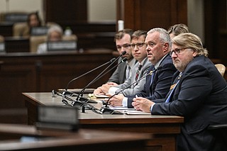 Marty Ryall (from right), director of the Division of Arkansas Heritage, Mike Wilson, assistant director of state parks, assistant attorney generals Justin Hughes and Justin Brascher take questions from legislators during the Game and Fish/State Police subcommittee meeting Monday, Nov. 17, 2025 at the state Capitol..(Arkansas Democrat-Gazette/Staci Vandagriff)