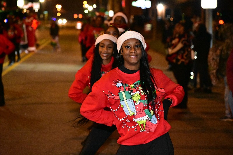 Dancers with Pine Bluff-based America's Superstars perform in lighted Christmas sweaters during the Mistletoe Magic Christmas Extravaganza parade on Saturday, Dec. 6, 2025. (Pine Bluff Commercial/I.C. Murrell)