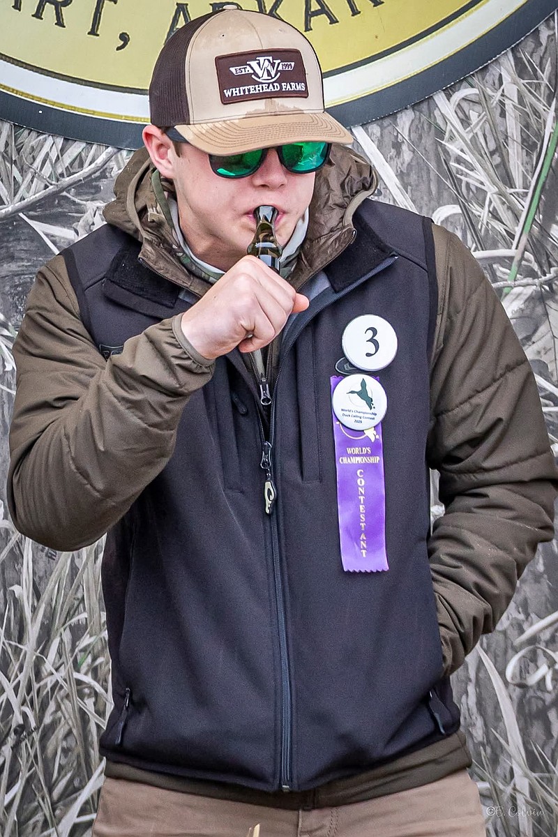 Hayes Kibe blows an Echo duck call during competition at the 90th Annual World’s Championship Duck Calling Contest on Nov. 29, 2025. (Pine Bluff Commercial/Eplunus Colvin)