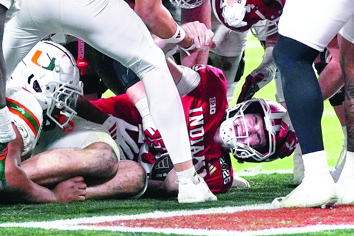 Indiana completes undefeated season with first national title, beats Miami in CFP final