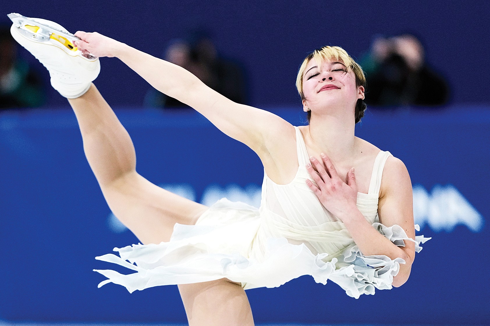 Liu gets in medal range as U.S. teammates stumble in short program ...
