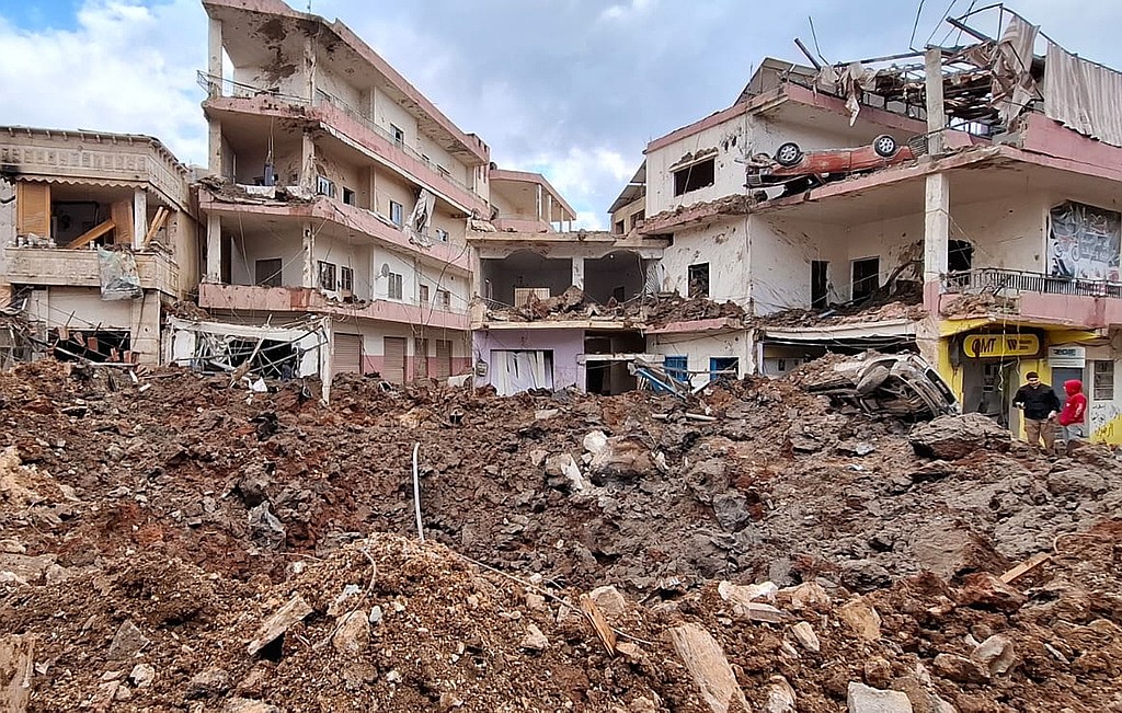 Iran's president apologizes for strikes on neighbors as missiles and drones still pound their cities