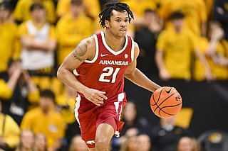 Former Arkansas basketball guard D.J. Wagner commits to Maryland ...