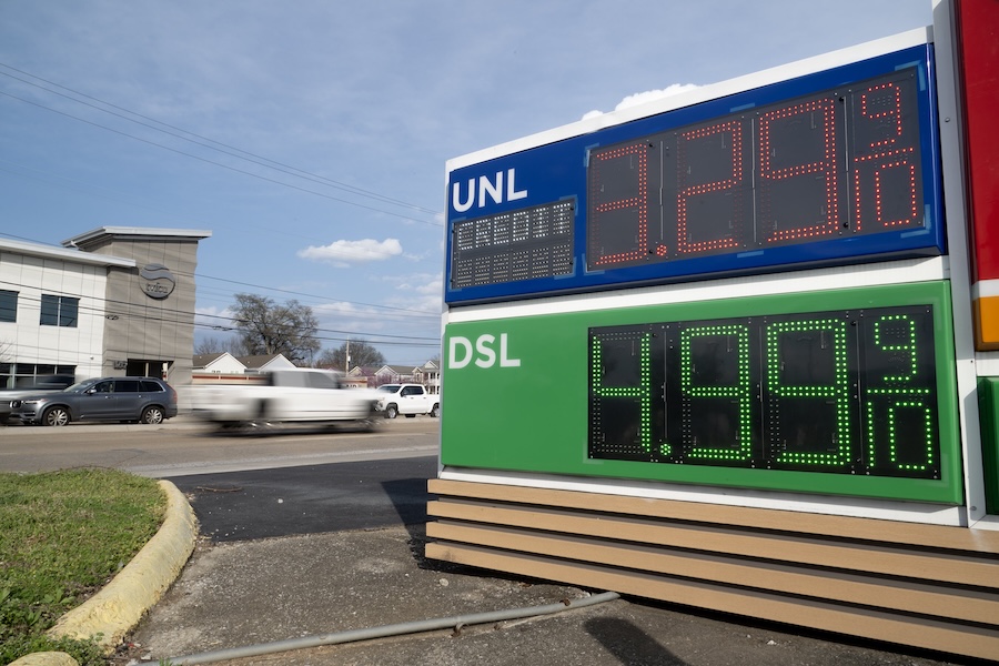Staff Photo by Seth Carpenter/ Vehicles pass by a gas station on West 20th Street on Monday, Mar. 9, 2026.