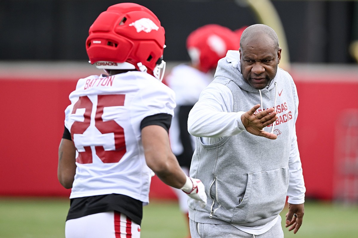 Position coach David 'YAC' Johnson wants the Arkansas running back room to go deep