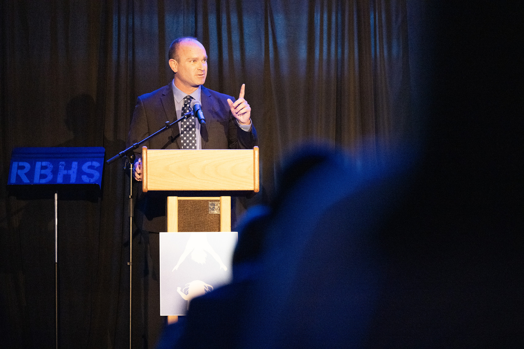 Staff Photo by Seth Carpenter/ Red Bank Principal Chris Tillett speaks at the State of the System for Hamilton County Schools.