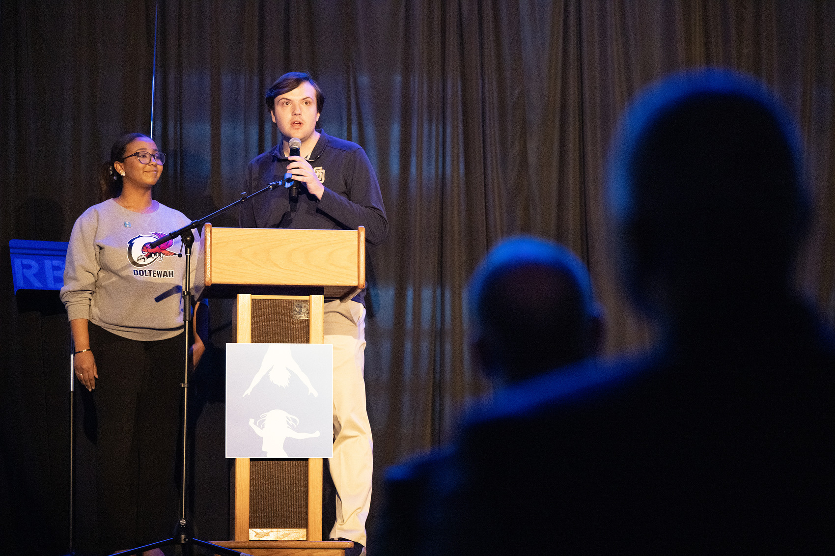 Staff Photo by Seth Carpenter/ Student representative Ryan Jenkins speaks alongside fellow representative Starr Saied at the State of the System.