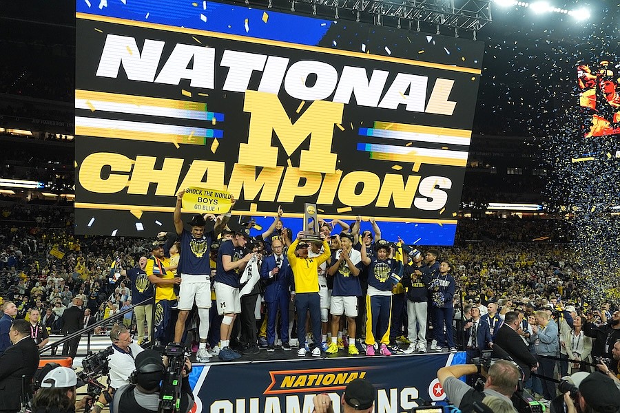 Michigan muscles its way to program's 2nd national title, beating stubborn UConn