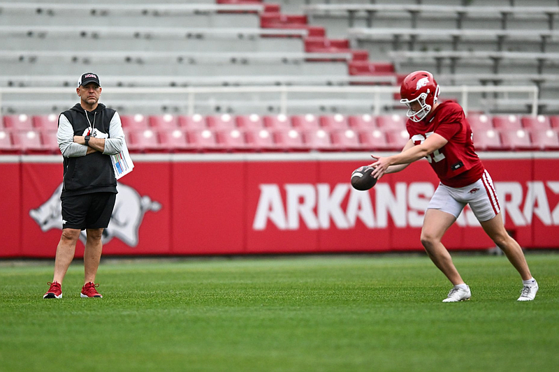 Arkansas special teams coordinator Chad Lunsford working with almost ...