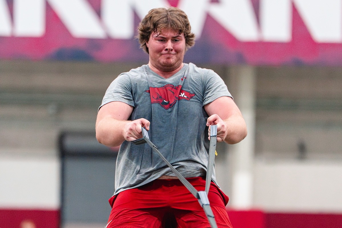 After moving from Malaysia to Texas, Arkansas football freshman Hugh Smith is used to change