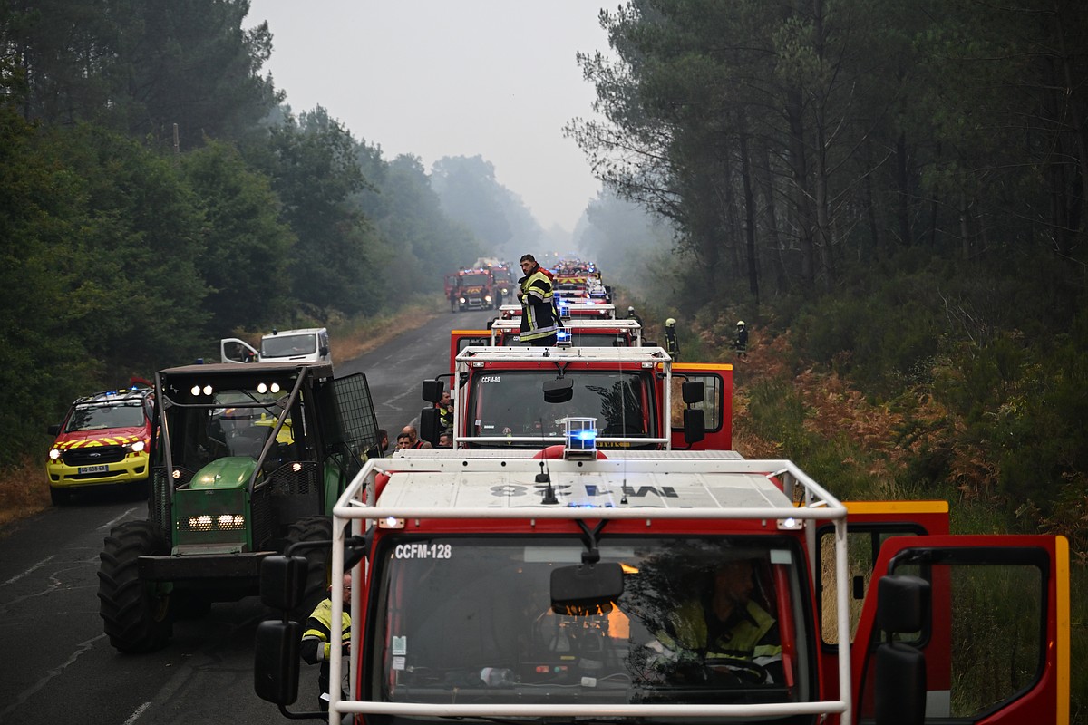 France and Spain battle wildfires as more than 250,000 people forced to flee homes