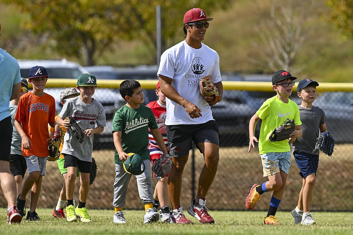 Arkansas baseball players spend Saturday teaching youngsters, building camaraderie