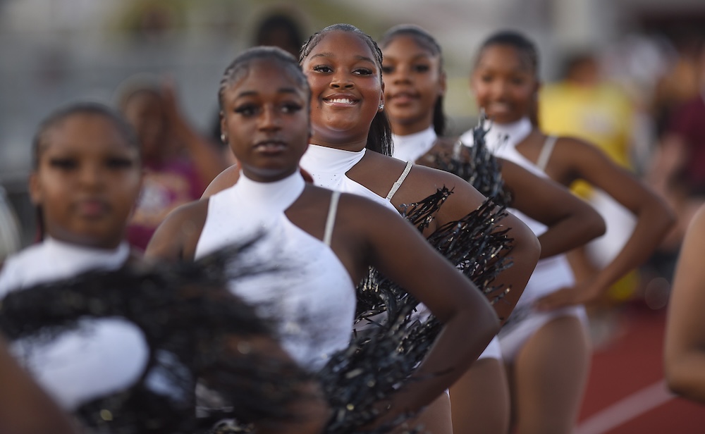 Staff photo by Matt Hamilton / Members of the Tyner dance team march onto the field before the start of their game against Red Bank at Tyner Academy on Friday, Sept. 4, 2026.