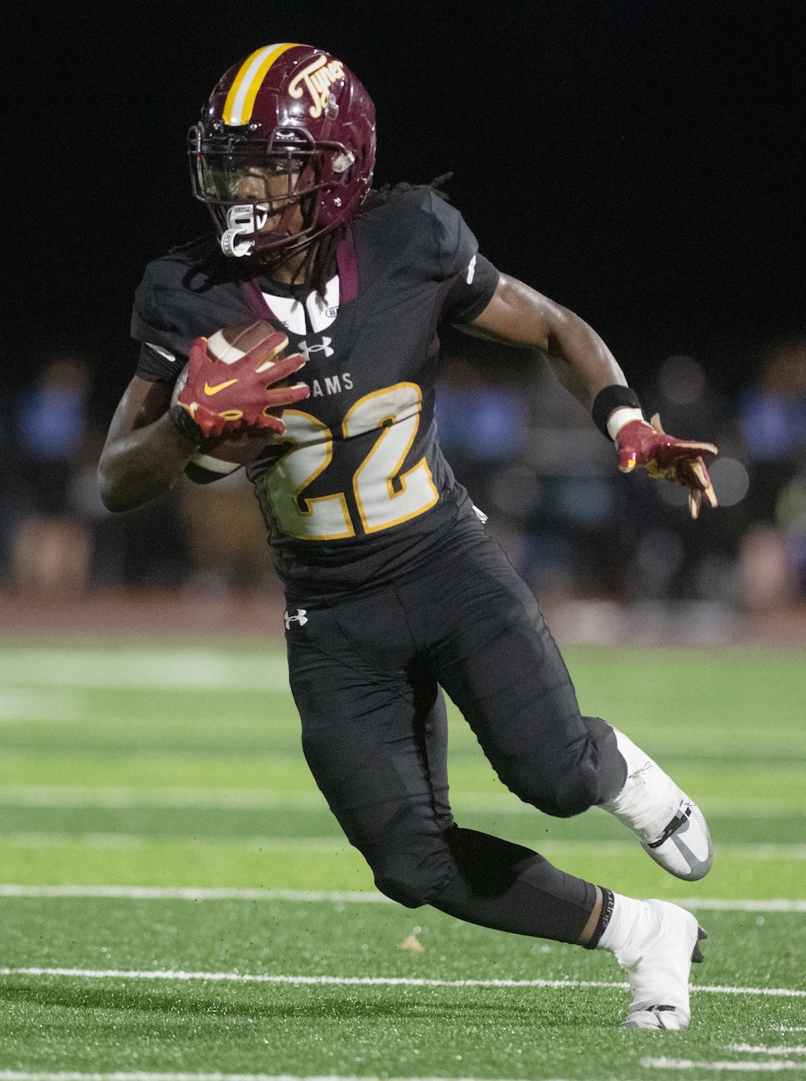 Staff photo by Matt Hamilton / Tyner (22) De’Aerion McNealy breaks into the open against Red Bank during their game at Tyner Academy on Friday, Sept. 4, 2026.