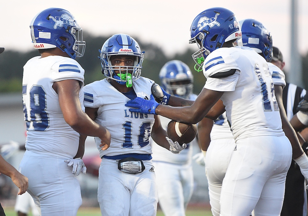 Staff photo by Matt Hamilton / Red Bank (10) Shawn Carter celebrates with teammates after scoring a touchdown during their game at Tyner Academy on Friday, Sept. 4, 2026.