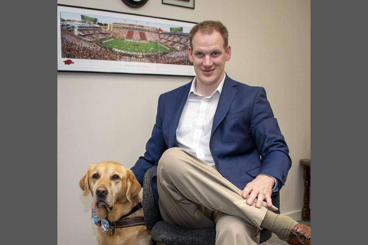 HIGH PROFILE: Charles Eric Yarberry, who lost his sight at 3 months old, is president and CEO of Little Rock-based Wo...