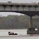 Three workers fell in the Arkansas River while working under the Interstate-430 bridge Wednesday. 