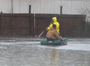 Firefighters used boats Thursday to rescue about two-dozen people in flooded areas near East 17th Street and Hazel Street in North Little Rock 