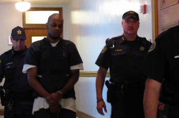 A mental exam and defense funding are still pending for Abdulhakim Muhammad, the man accused of fatally shooting one soldier and injuring another outside a Little Rock recruiting station.