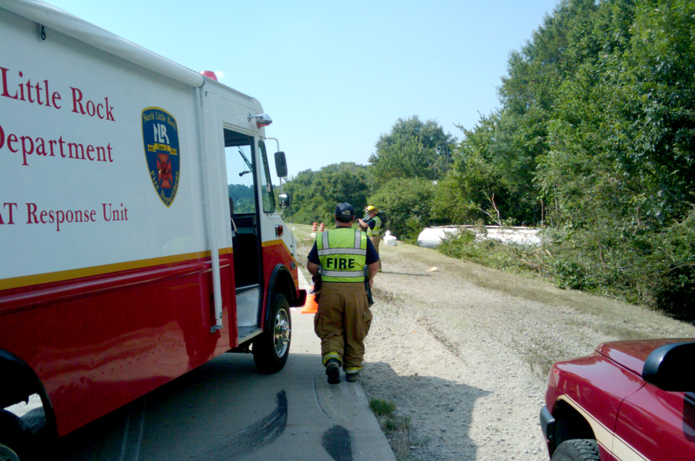 Trailer carrying gasoline and diesel fuel tips over near Crystal Hill exit on I-40