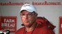 Arkansas defensive coordinator Willy Robinson addresses the media after practice Tuesday at Razorback Stadium.