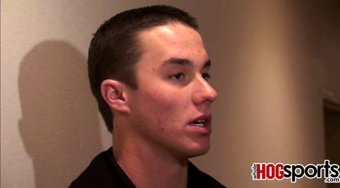Arkansas catcher and team captain James McCann updates the Razorbacks' preseason workouts Monday at the Swatter's Club in Fayetteville. 