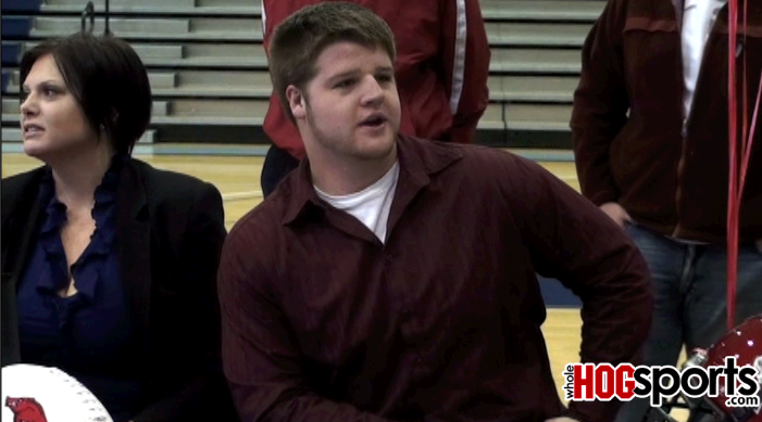 Arkansas signee Brey Cook holds his signing ceremony Tuesday at Springdale Har-Ber High School. Though National Signing Day was last week, local athletes held their ceremonies late because of inclement weather. 