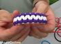 Watch this video to learn how to make a survival bracelet.