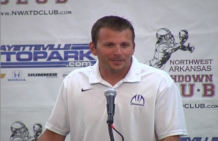 Rogers coach Shawn Flannigan talks to the Northwest Arkansas Touchdown Club on Wednesday following his team's 26-13 win over crosstown rival Rogers Heritage last week. 