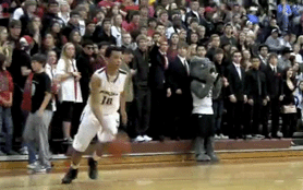 Springdale High sophomore guard Jordan Dennis performs a poster dunk against Springdale Har-Ber to regain momentum for the Red'Dogs.