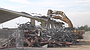 The final stages of the demolition of the Bulldog Gym began Tuesday morning when heavy equipment started cutting into the metal roof and supports.