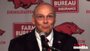 John L. Smith speaks following his introduction as Arkansas' football coach on Tuesday. 