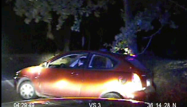 Lance Duffy, who had earlier shot a Rogers police officer, shot himself after trying to flee in his vehicle. The video, which has no sound, has been edited to end before deputies pull Duffy from his vehicle.
