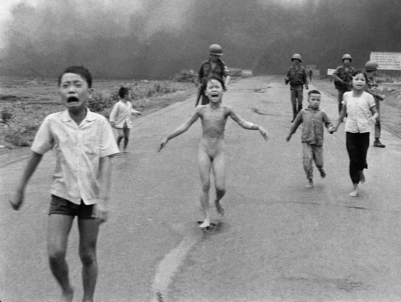 AP 'napalm girl' photo from Vietnam War turns 40. In the picture, the girl will always be 9 years old and wailing "Too hot! Too hot!" as she runs down the road away from her burning Vietnamese village.