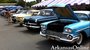 Bidders look at some of the nearly 140 cars in the Salmon Brothers Collection on Friday morning during a preview for today&#x27;s auction. All the cars will be sold at no reserve.