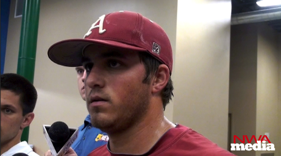 Arkansas pitcher DJ Baxendale speaks following the Razorbacks' practice Friday in Omaha, Neb. 