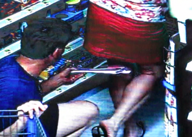 A Conway man is accused of secretly aiming a digital camera up a female shopper's skirt and recording video. Surveillance footage provided by Conway Police Department.