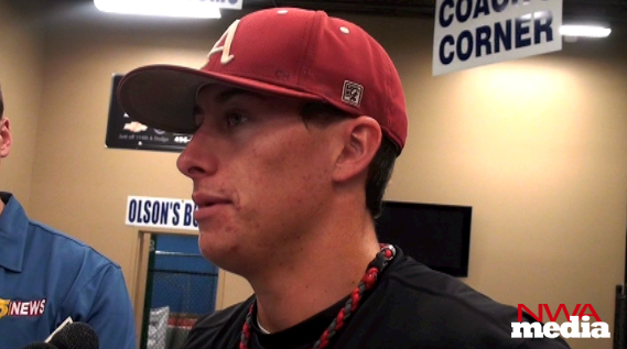 Arkansas first baseman Dominic Ficociello speaks following the Razorbacks' practice Friday in Omaha, Neb. 