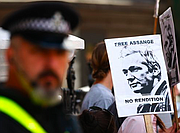 WikiLeaks founder Julian Assange is beyond the grasp of British authorities as long as he is holed up in Ecuador&#x27;s London embassy, the government said Wednesday. But he faces arrest if he steps outside. (June 20)