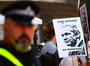 WikiLeaks founder Julian Assange is beyond the grasp of British authorities as long as he is holed up in Ecuador&#x27;s London embassy, the government said Wednesday. But he faces arrest if he steps outside. (June 20)