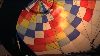 Hot air balloons dotted the city's sky tonight as pilots drifted above crowds in the park.

The balloons floated over War Memorial Park, tethered to trucks or vans, as a band played. At dusk, the balloons performed a balloon glow, the burners illuminating the aircraft in an overhead light display. 
