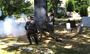 Two Civil War re-enactors fire a cannon Sunday in remembrance of 19 dead soldiers, who remained tombstones for as long as 150 years at Mount Holly cemetery.
