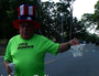 Steve Eubanks explains how volunteers should offer water to runners at the 36th annual Firecracker Fast 5K&#x27;s only water stop.
