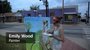 Emily Wood paints the traffic control box at Main and 7th in North Little Rock on Thursday.
