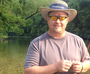 With a few plastic crawdad imitators, Alan Thomas of Russellville demonstrates an effective way to catch smallmouth bass during hot, dry weather on the Buffalo River.