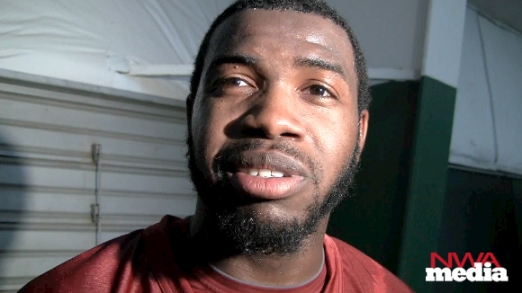 Arkansas quarterback Brandon Mitchell recaps the Razorbacks' practice on Thursday. 