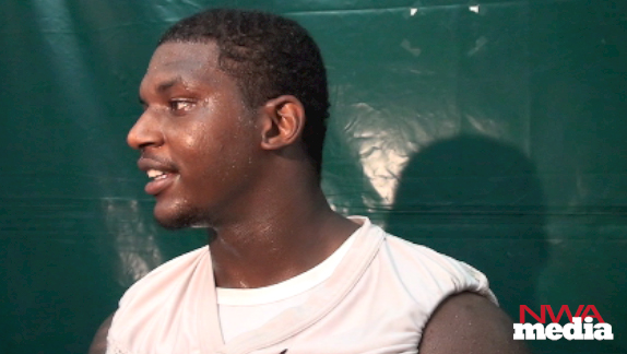 Arkansas linebacker Tenarius Wright recaps the Razorbacks' practice on Friday. 